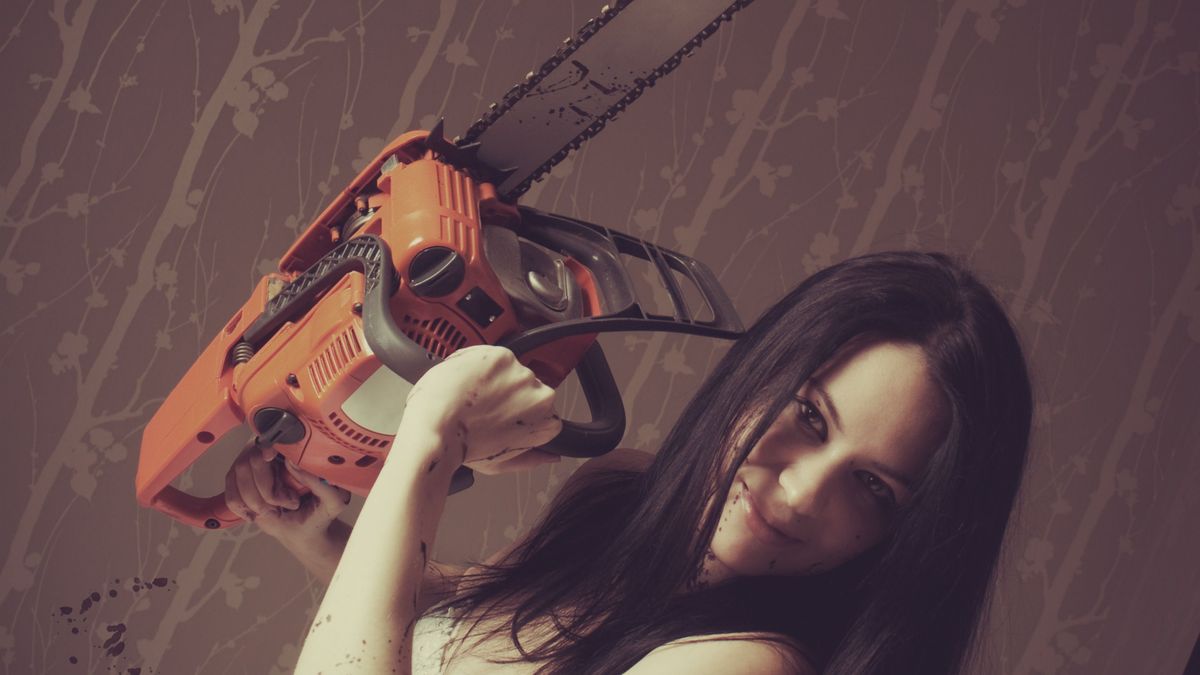 Seductive,Bride,With,Bloody,Chainsaw.,Indoors,Shooting.