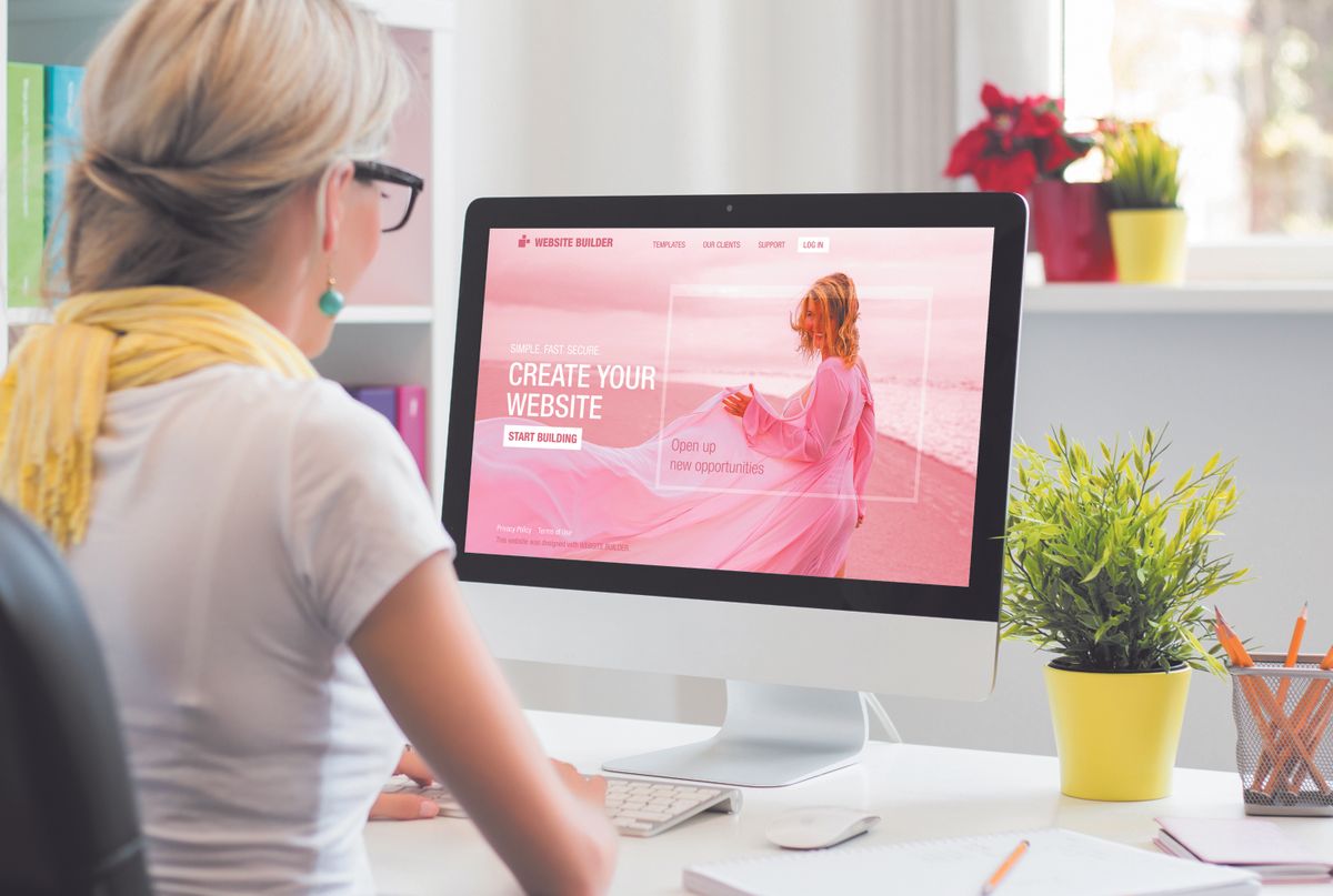 Woman,Creating,Her,Own,Website,On,Computer